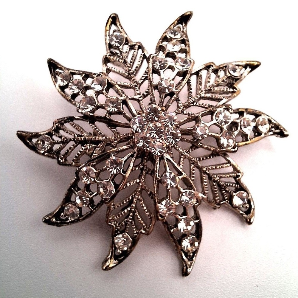 Vintage Kenneth Cole snowflake flower brooch clear rhinestones silver tone